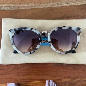 Tom’s tortoise shell sunglasses
